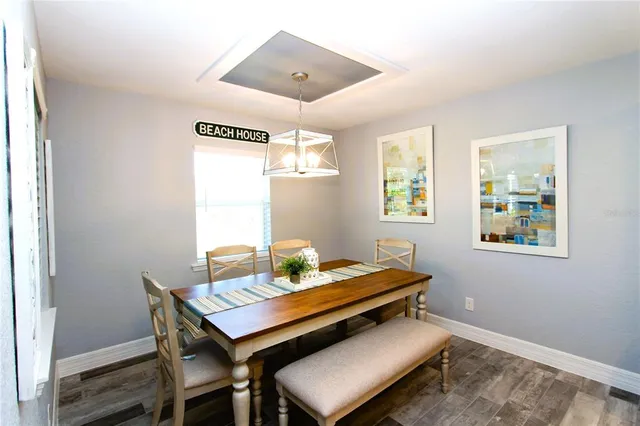 a reading room with furniture and a window