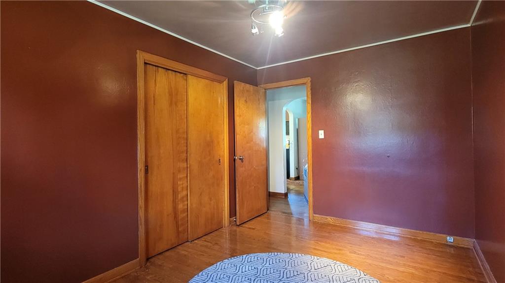 1245 Blacks Hill Road Boswell, PA 15531 - Photo 23 of 48 an empty room with wooden floor and a window