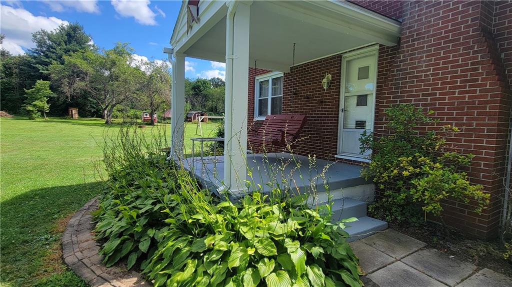 1245 Blacks Hill Road Boswell, PA 15531 - Photo 4 of 48 a backyard of a house with lots of green space