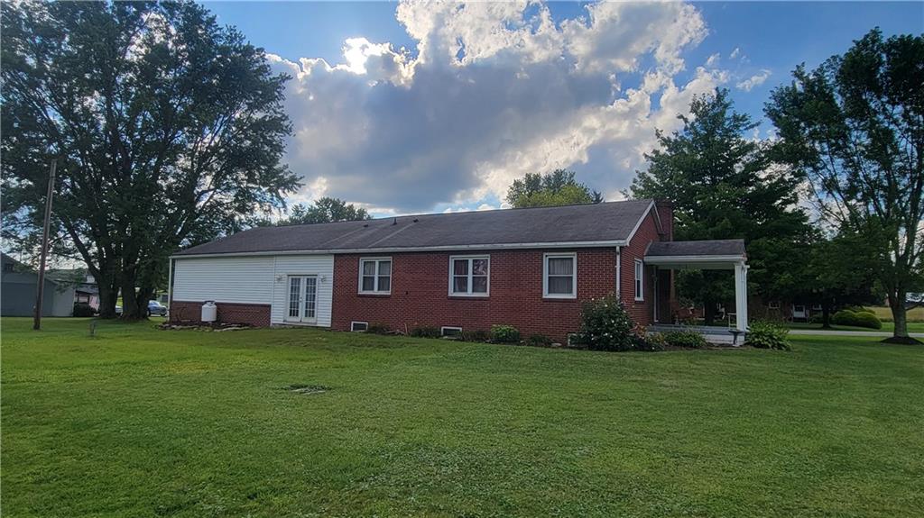 1245 Blacks Hill Road Boswell, PA 15531 - Photo 45 of 48 a brick house with a yard