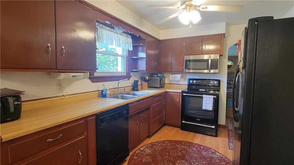 1245 Blacks Hill Road Boswell, PA 15531 - Photo 7 of 48 a kitchen with refrigerator cabinets and a sink