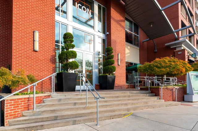 a view of a building with a street