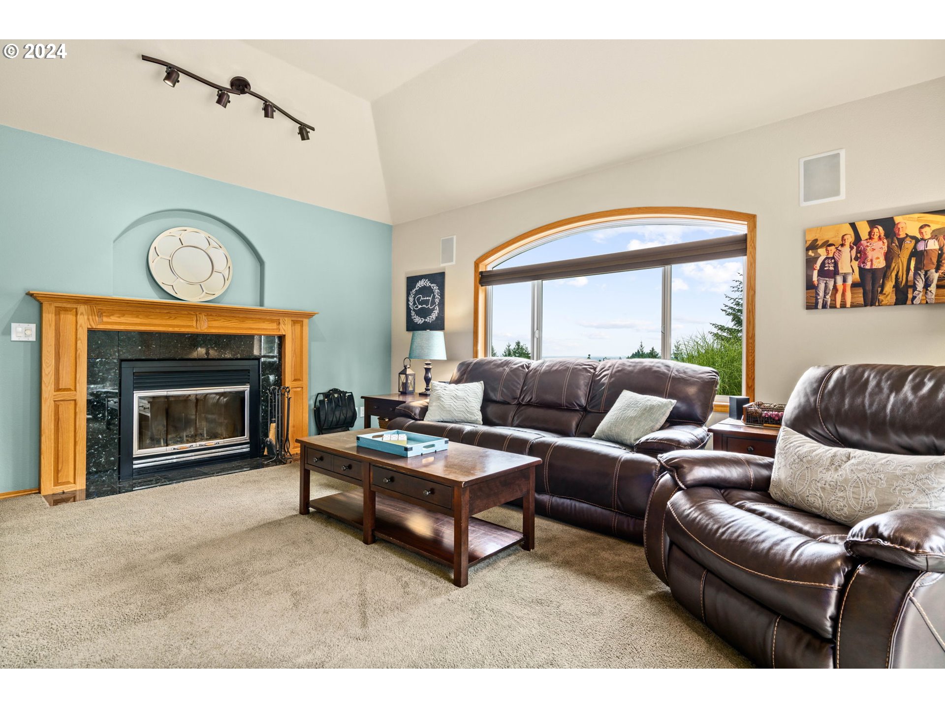 25241 Hall Road Cheshire, OR 97419 - Photo 11 of 48 a living room with furniture and a fireplace