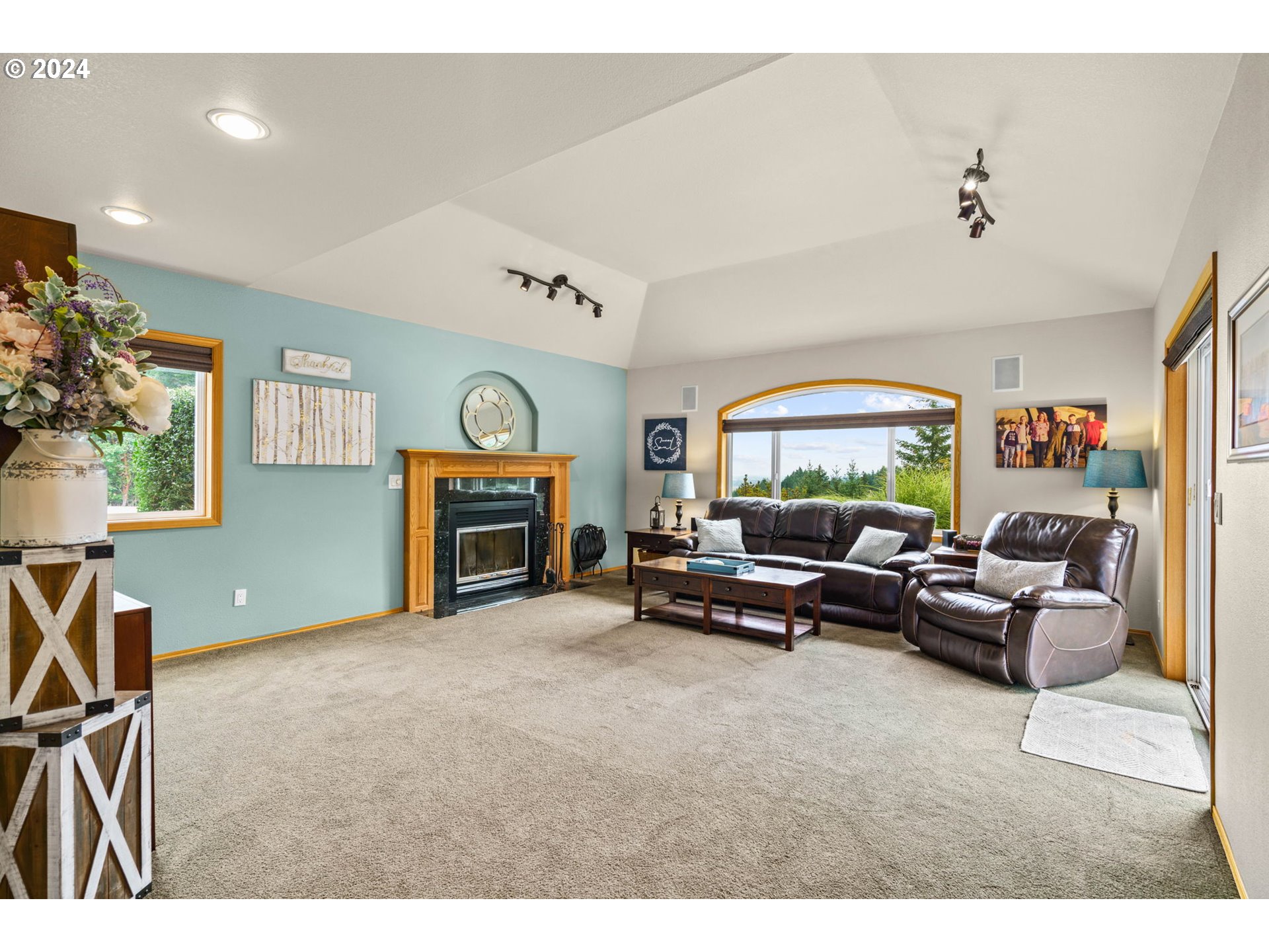 25241 Hall Road Cheshire, OR 97419 - Photo 12 of 48 a living room with furniture and a fireplace