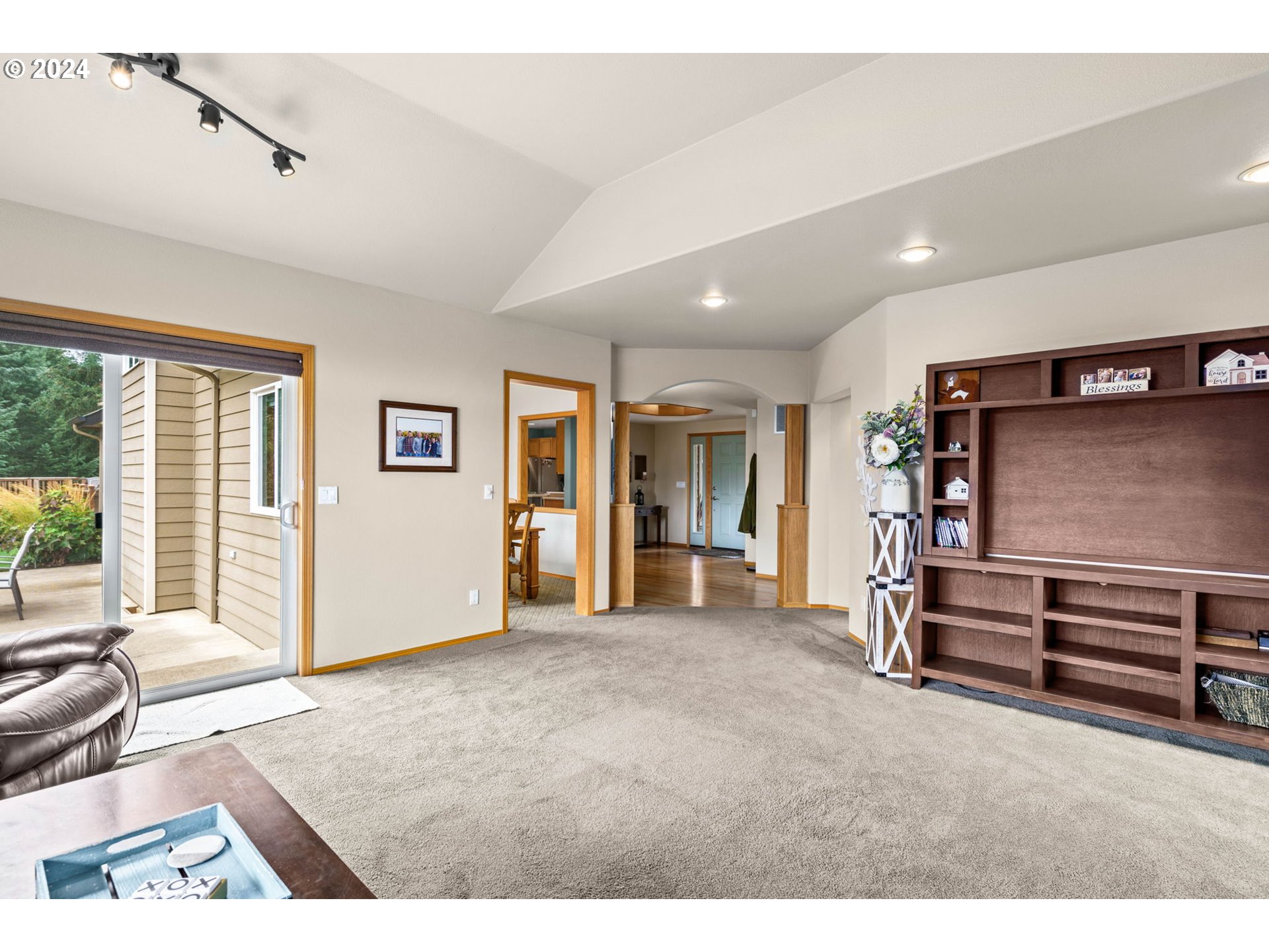 25241 Hall Road Cheshire, OR 97419 - Photo 13 of 48 a view of an empty room with furniture and windows