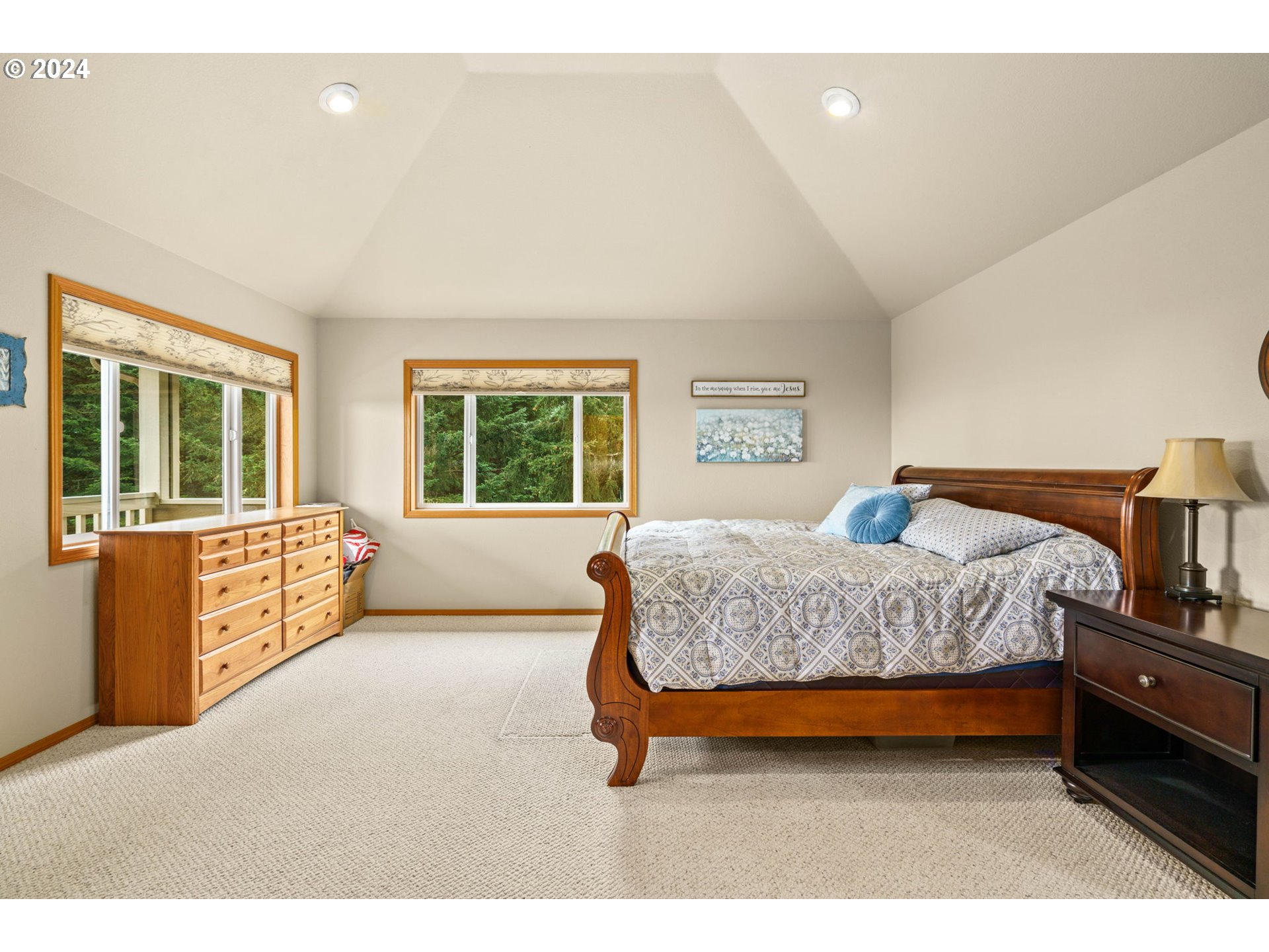 25241 Hall Road Cheshire, OR 97419 - Photo 20 of 48 a bedroom with a bed and window