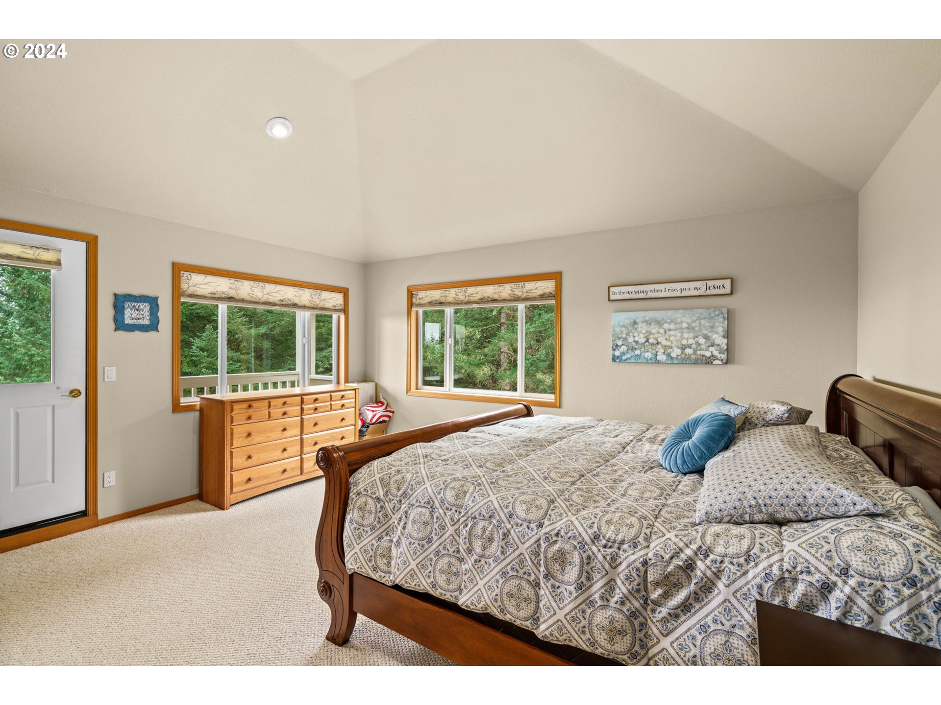 25241 Hall Road Cheshire, OR 97419 - Photo 22 of 48 a bedroom with a large bed and a window