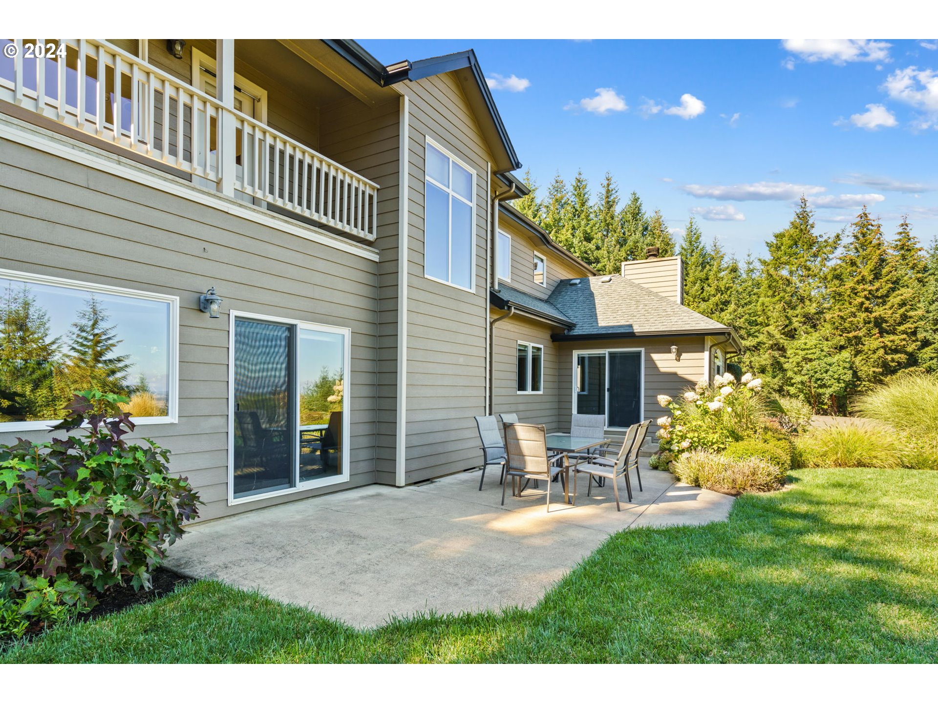 25241 Hall Road Cheshire, OR 97419 - Photo 36 of 48 a view of a house with backyard porch and sitting area