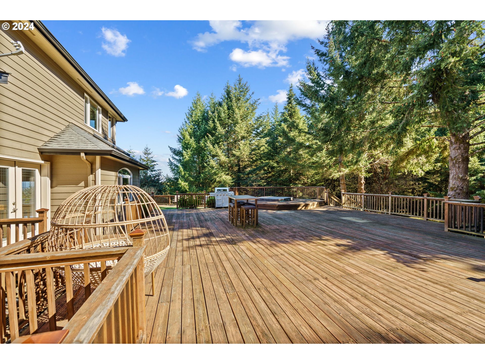 25241 Hall Road Cheshire, OR 97419 - Photo 41 of 48 a view of a swimming pool with a patio and wooden fence