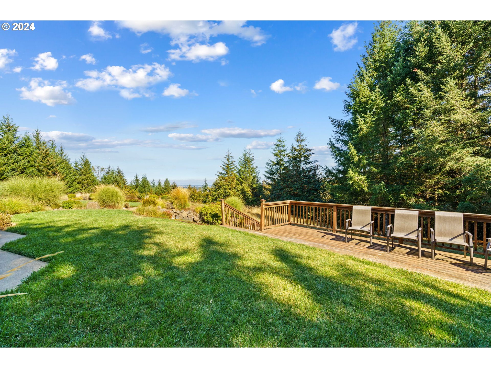 25241 Hall Road Cheshire, OR 97419 - Photo 43 of 48 a view of a backyard with plants and a patio