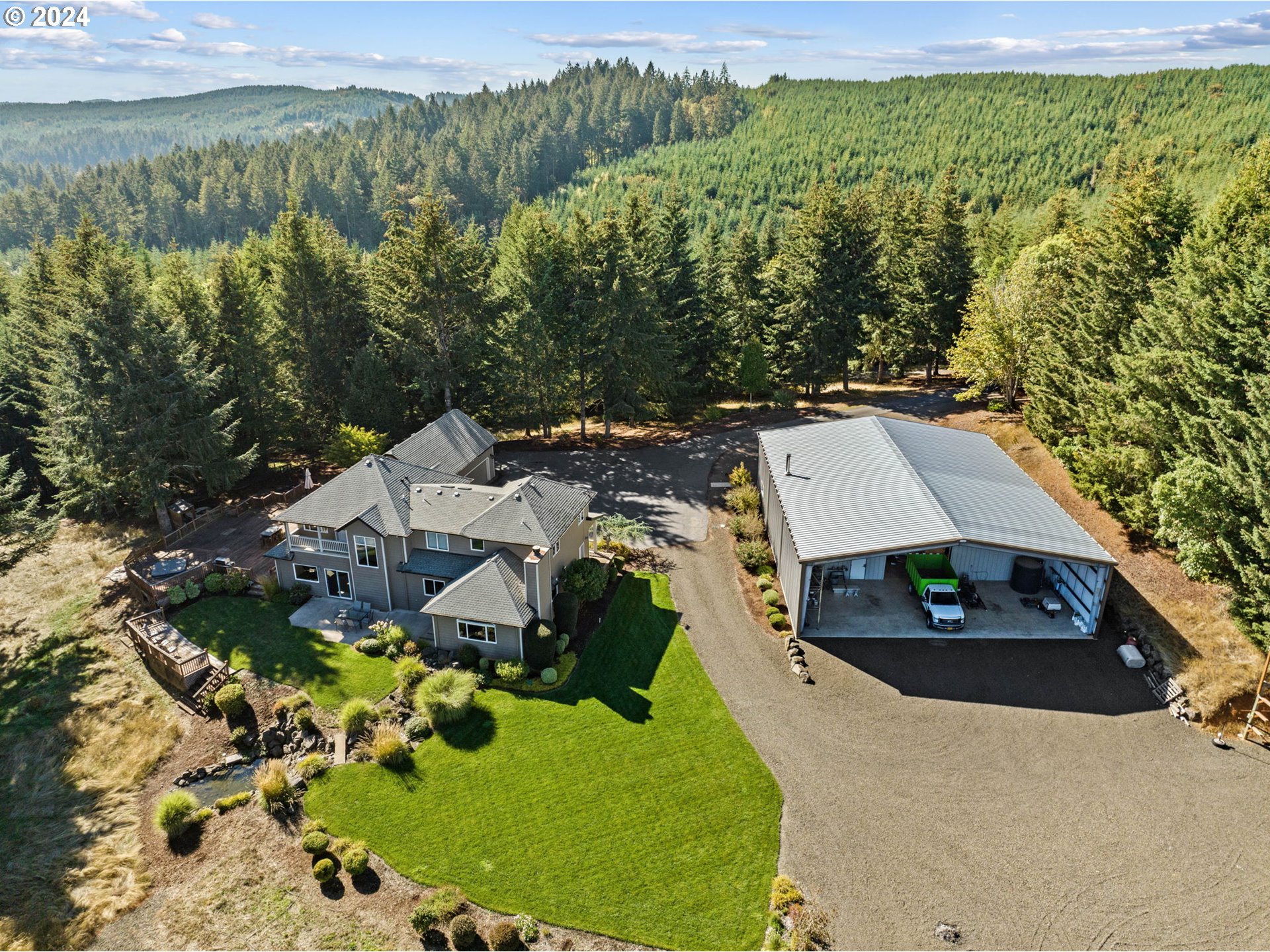 25241 Hall Road Cheshire, OR 97419 - Photo 47 of 48 an aerial view of a house with a yard