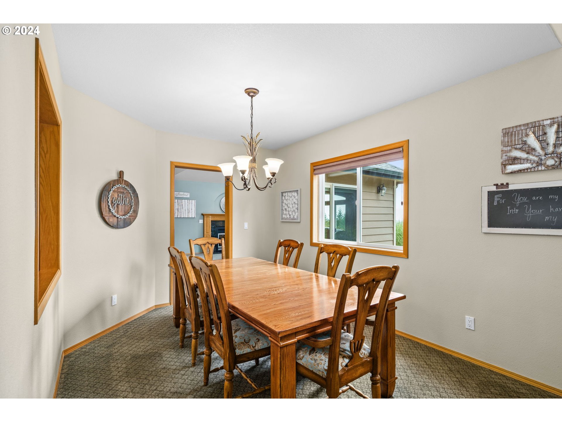 25241 Hall Road Cheshire, OR 97419 - Photo 9 of 48 a view of a dining room with furniture window and wooden floor