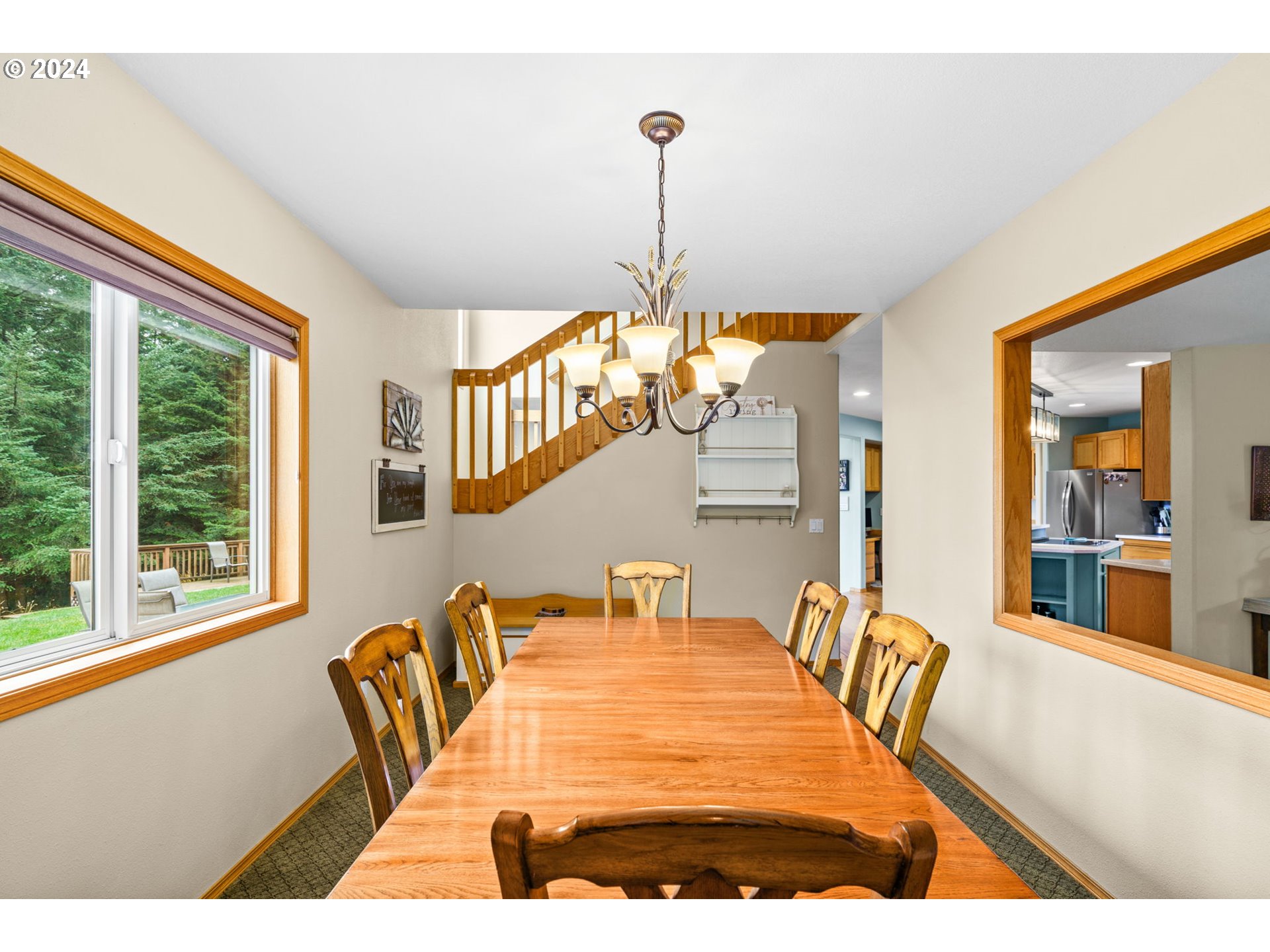 25241 Hall Road Cheshire, OR 97419 - Photo 10 of 48 a view of a dining room with furniture window and outside view