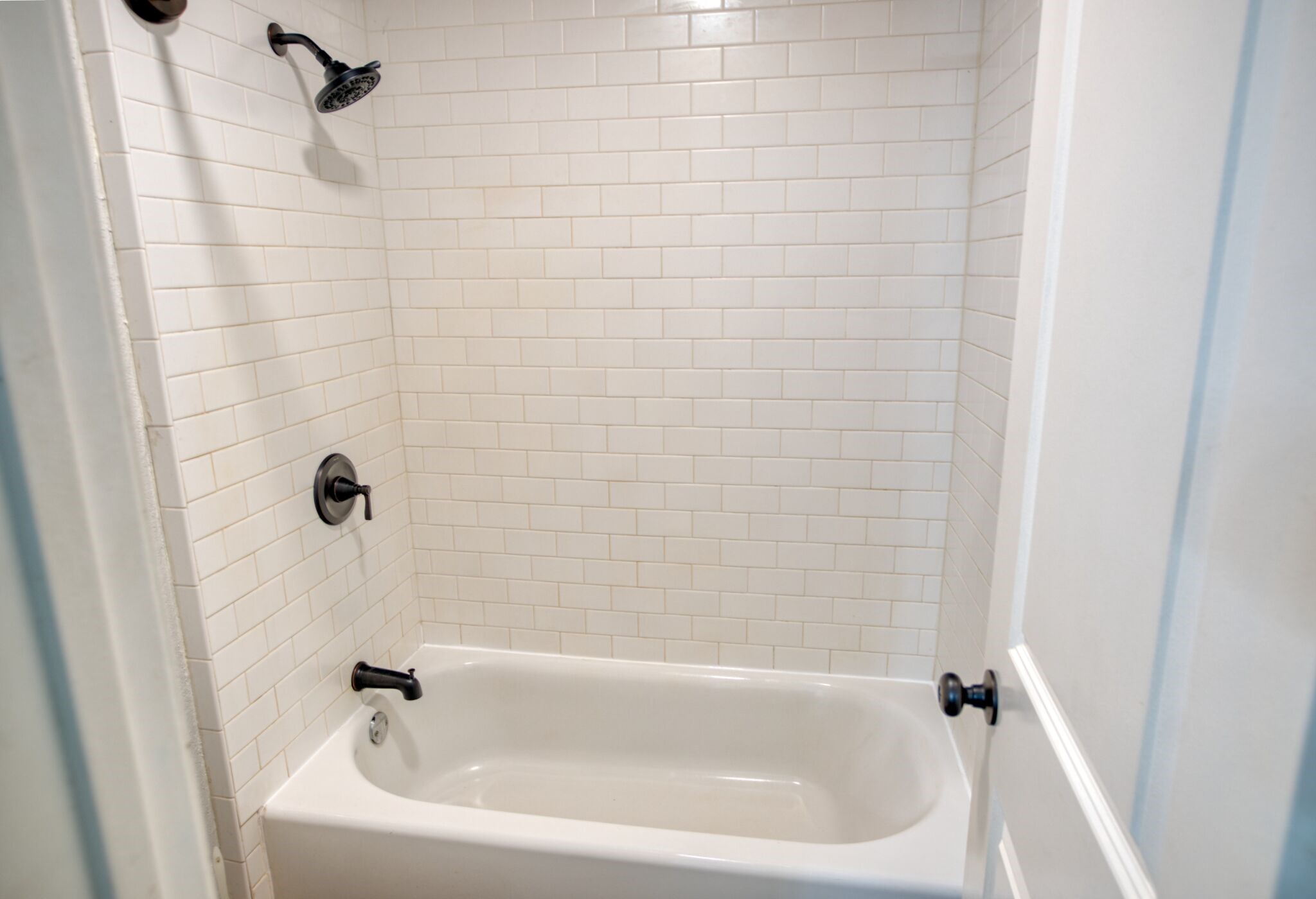 3836 Brazos River Road, Unit CR400 Freeport, TX 77541 - Photo 14 of 43 a bathroom with a tub