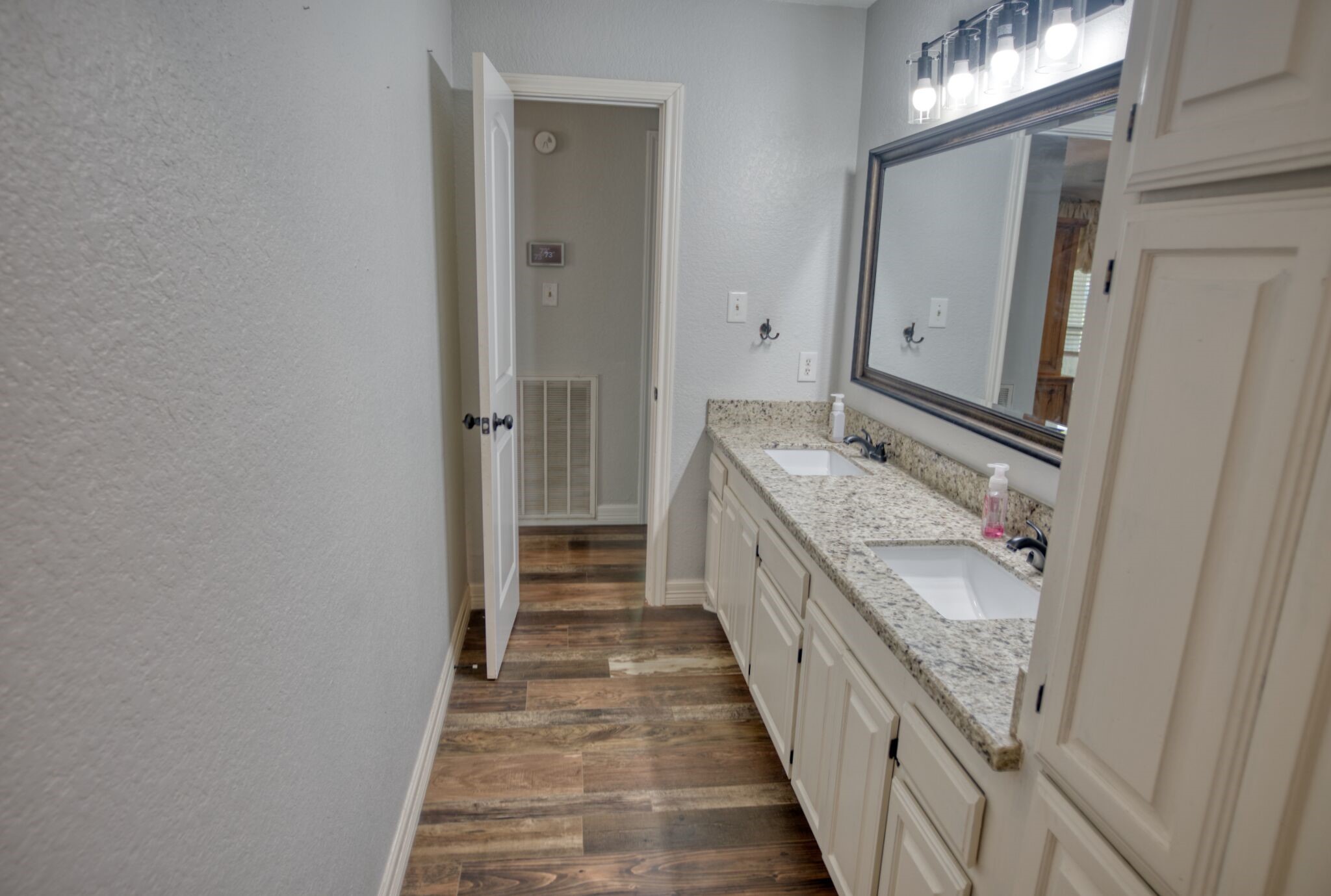 3836 Brazos River Road, Unit CR400 Freeport, TX 77541 - Photo 15 of 43 a bathroom with sink and mirror