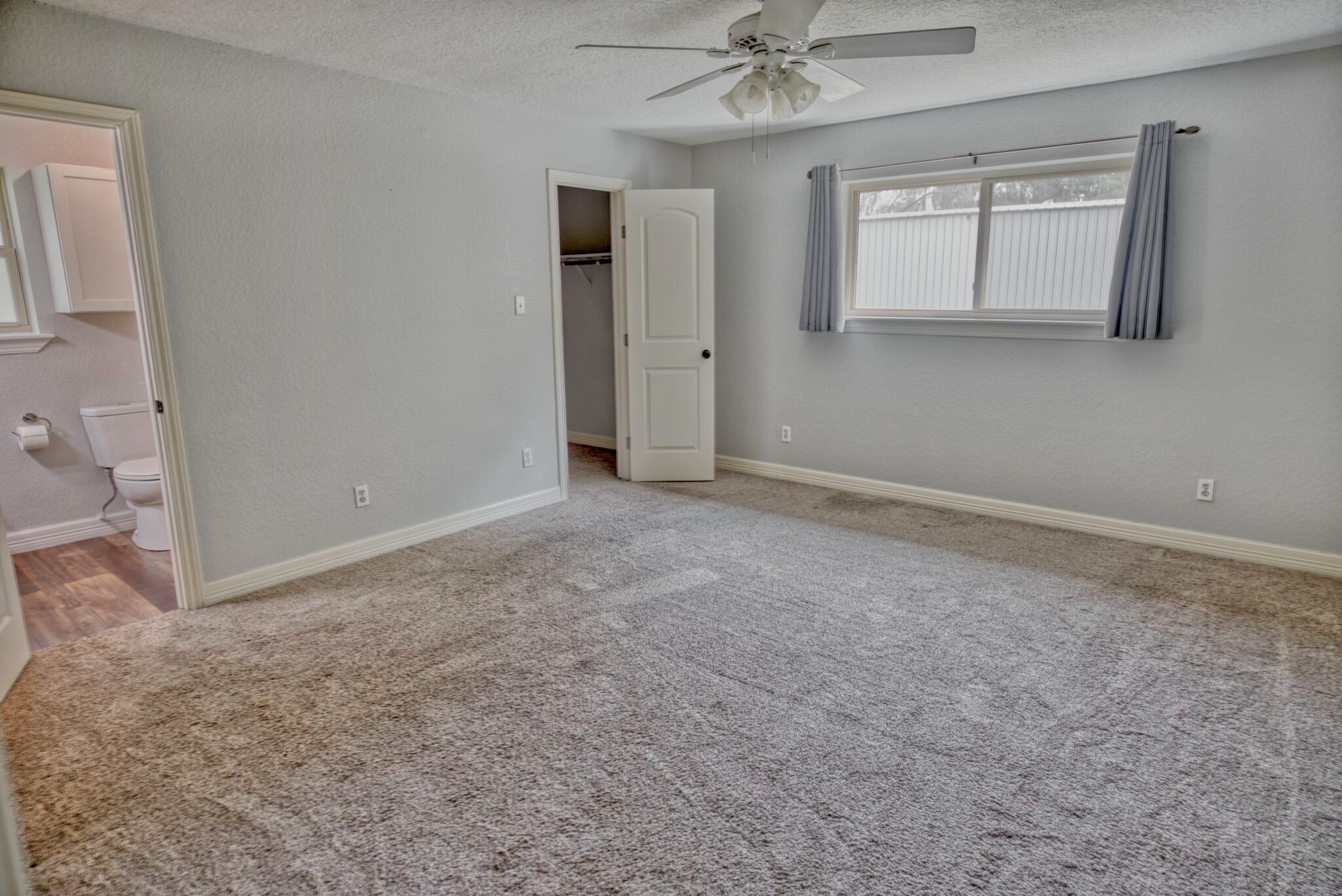 3836 Brazos River Road, Unit CR400 Freeport, TX 77541 - Photo 16 of 43 a view of an empty room with a window