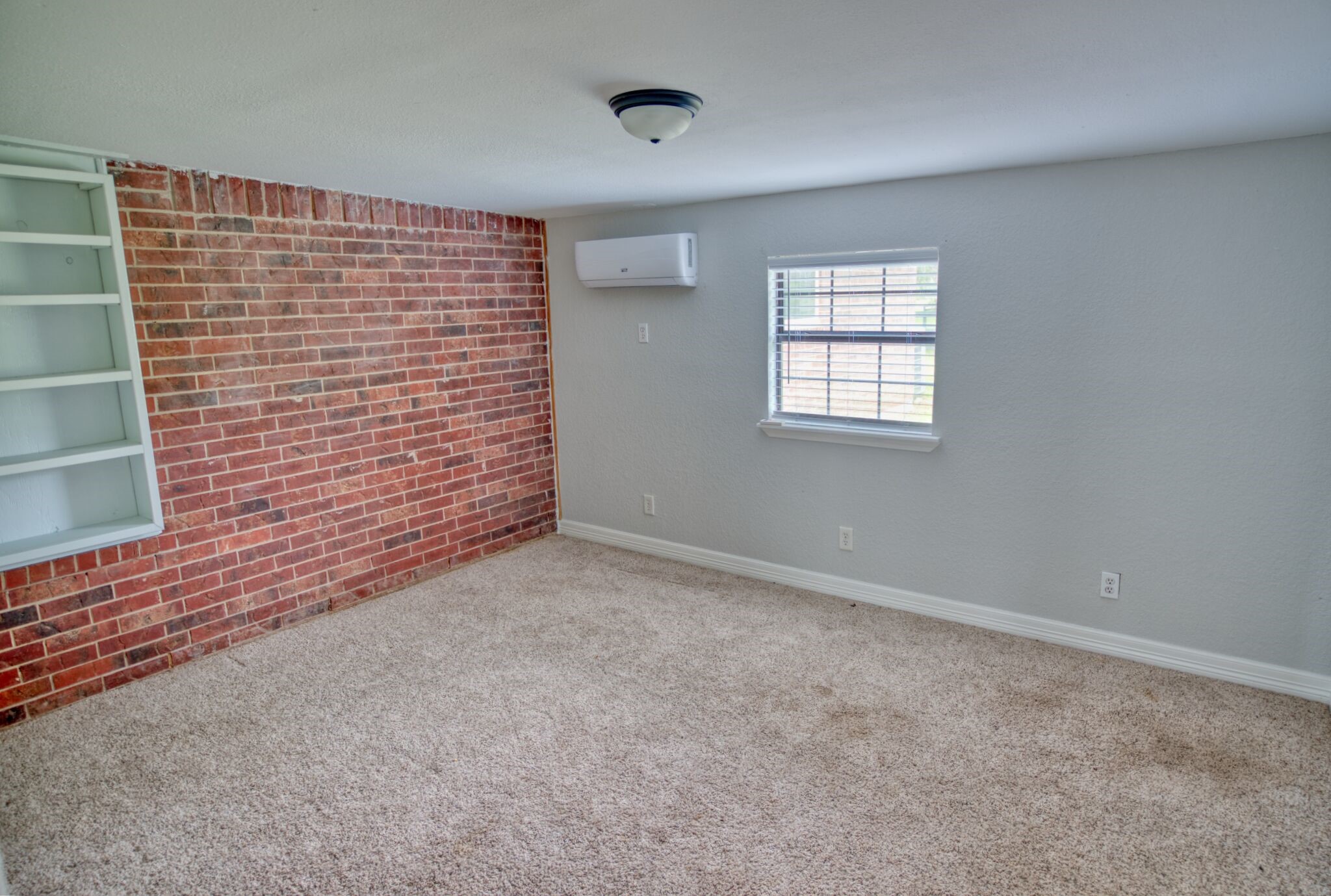 3836 Brazos River Road, Unit CR400 Freeport, TX 77541 - Photo 24 of 43 a view of an empty room with a window
