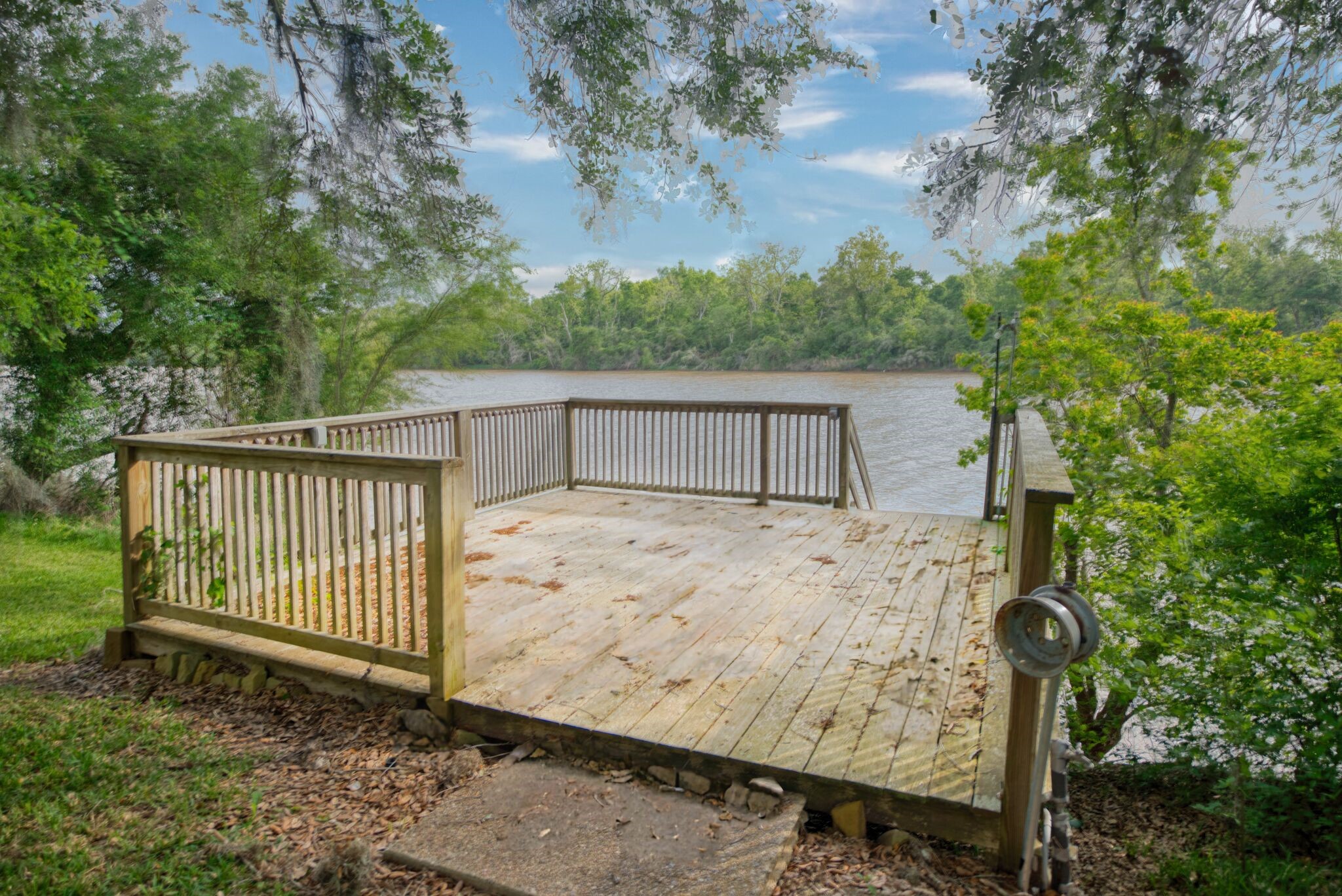 3836 Brazos River Road, Unit CR400 Freeport, TX 77541 - Photo 37 of 43 a view of a house with a backyard and tree