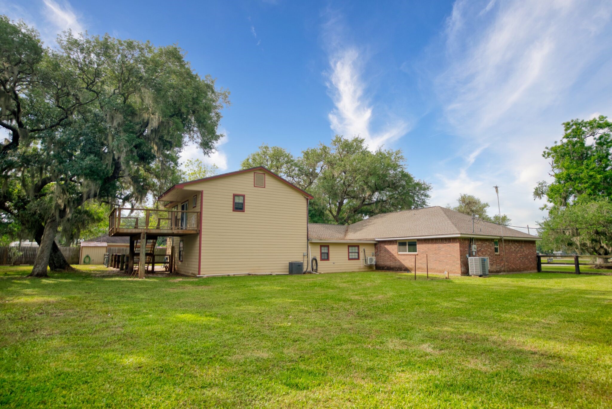 3836 Brazos River Road, Unit CR400 Freeport, TX 77541 - Photo 4 of 43 a front view of house with yard and seating area