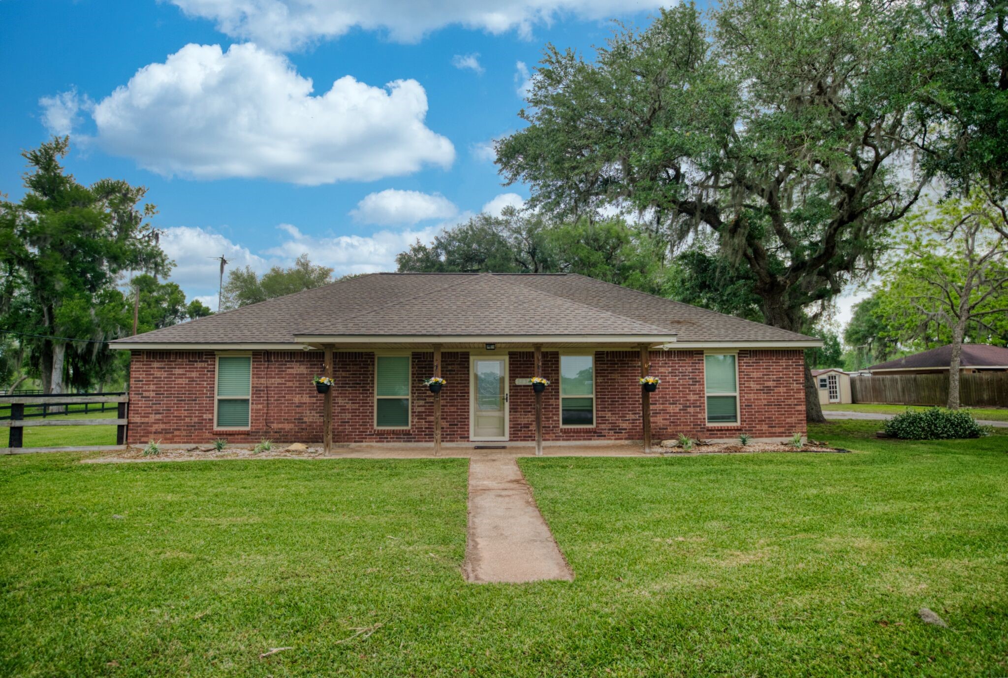 3836 Brazos River Road, Unit CR400 Freeport, TX 77541 - Photo 5 of 43 a front view of house with yard and green space