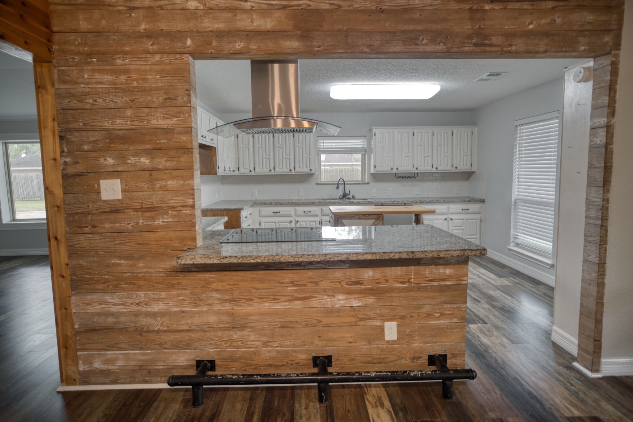 3836 Brazos River Road, Unit CR400 Freeport, TX 77541 - Photo 8 of 43 a close view of kitchen sink microwave and cabinets
