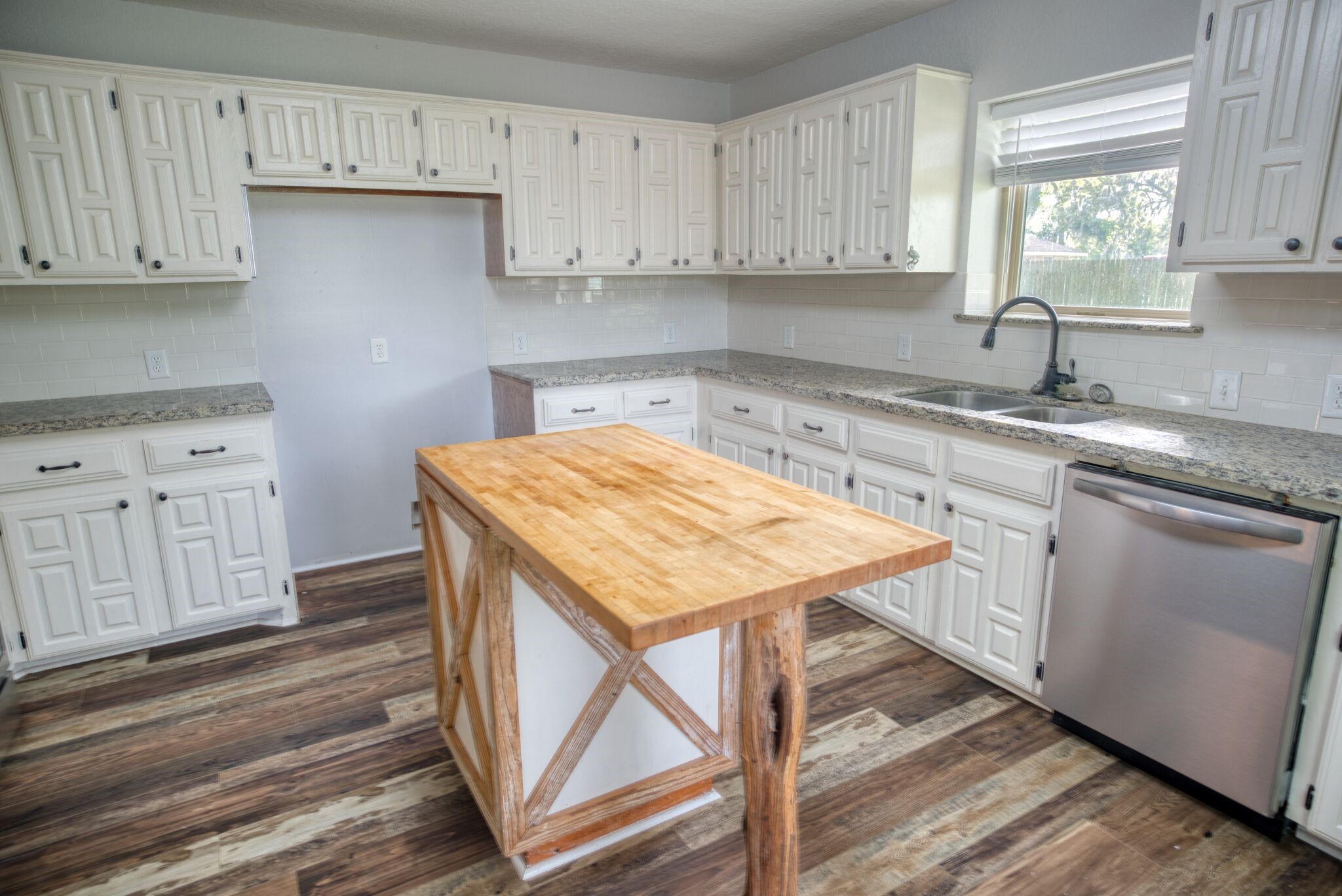 3836 Brazos River Road, Unit CR400 Freeport, TX 77541 - Photo 10 of 43 a kitchen with stainless steel appliances granite countertop a sink stove and cabinets