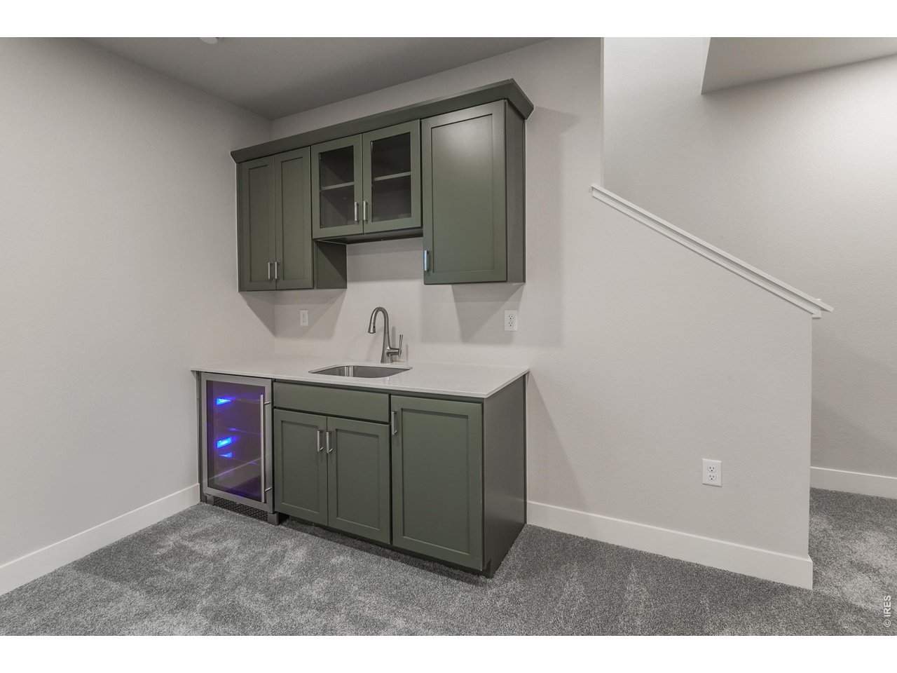774 Trumpet Court Windsor, CO 80550 - Photo 31 of 49 WET BAR IN FINISHED BASEMENT