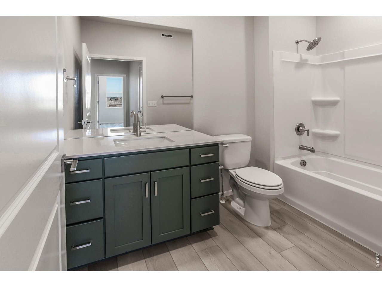 774 Trumpet Court Windsor, CO 80550 - Photo 8 of 49 a bathroom with a sink a toilet and shower
