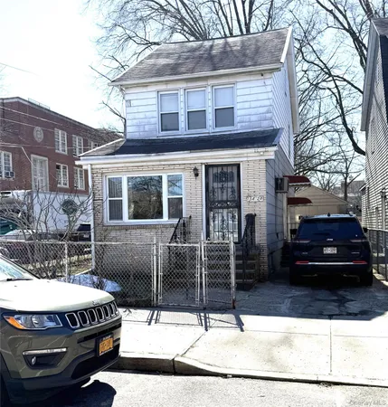 a view of a patio with table and chairs and potted plants