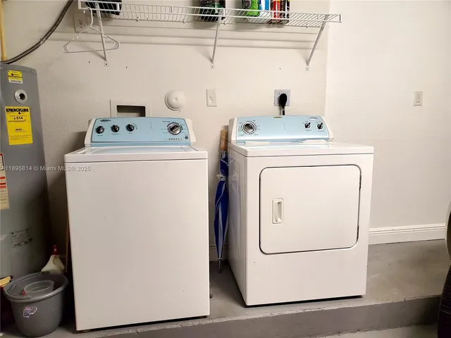 a view of a house with yard and entertaining space