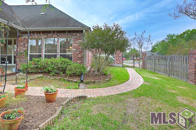 4407 Antler Drive Baton Rouge, LA 70817 - Photo 25 of 32 Paver Walkway to Side Gate