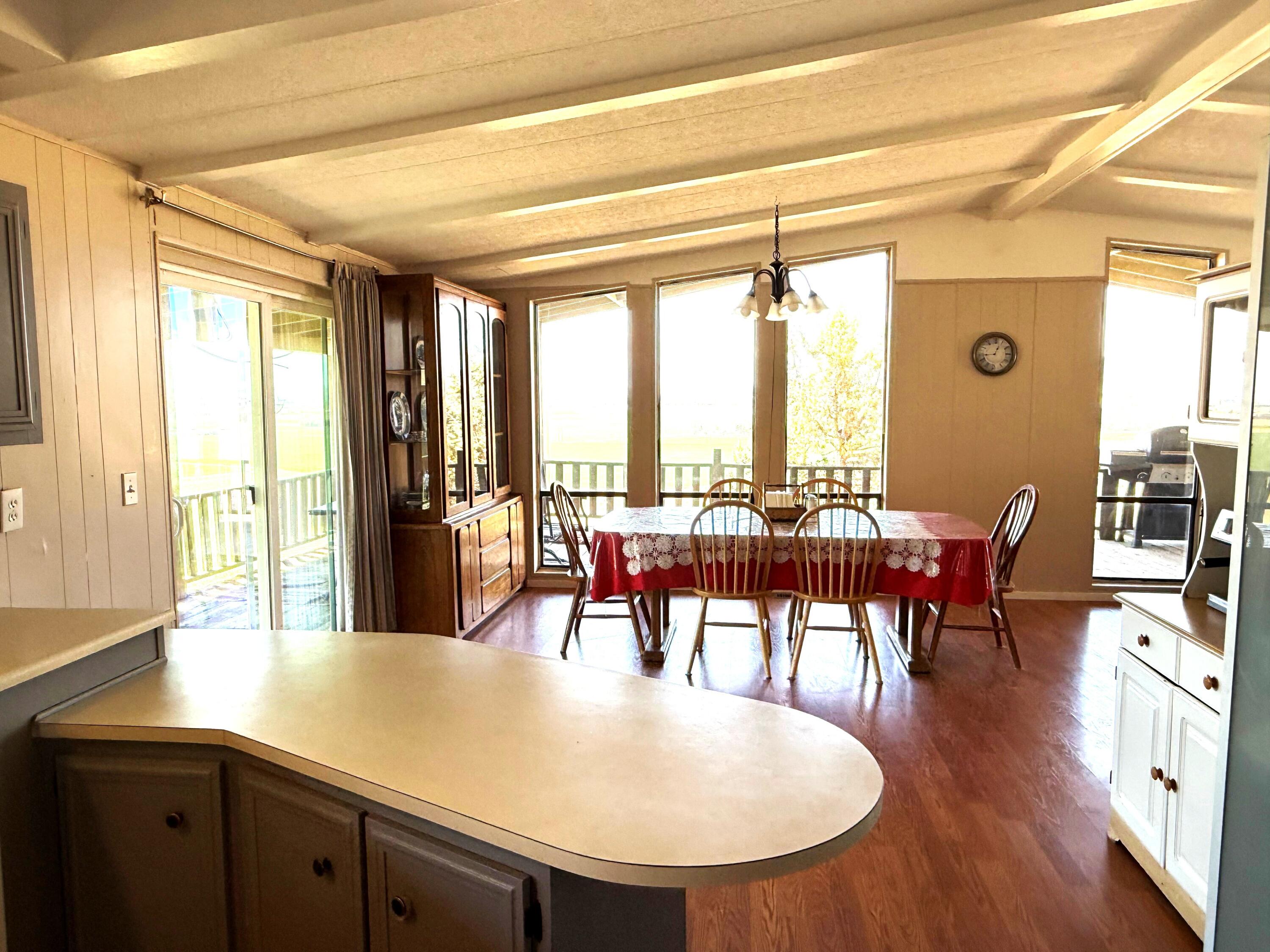 17550 Maupin Road Malin, OR 97632 - Photo 18 of 62 a dining room with furniture and wooden floor