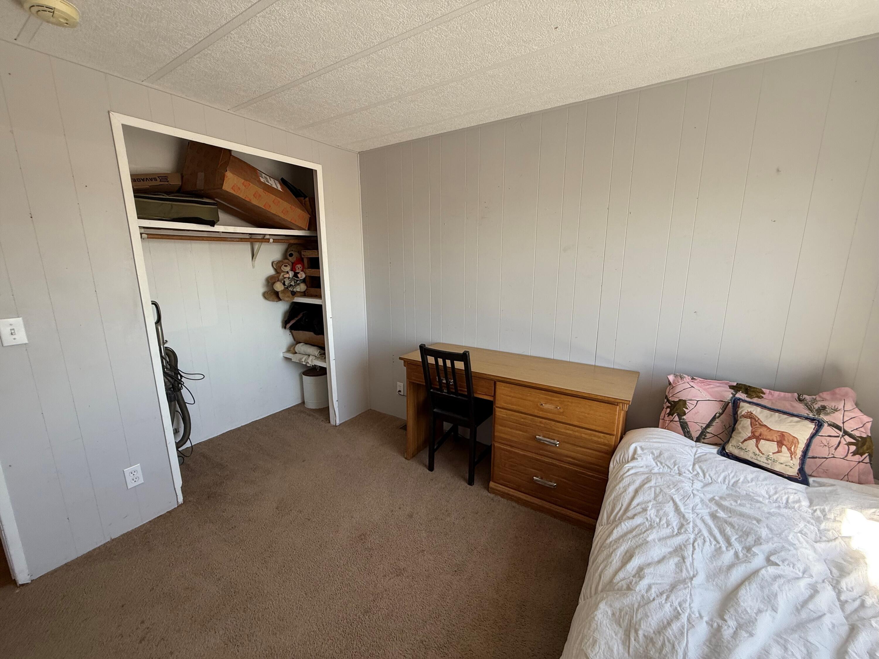 17550 Maupin Road Malin, OR 97632 - Photo 33 of 62 a bedroom with a bed and a cabinets