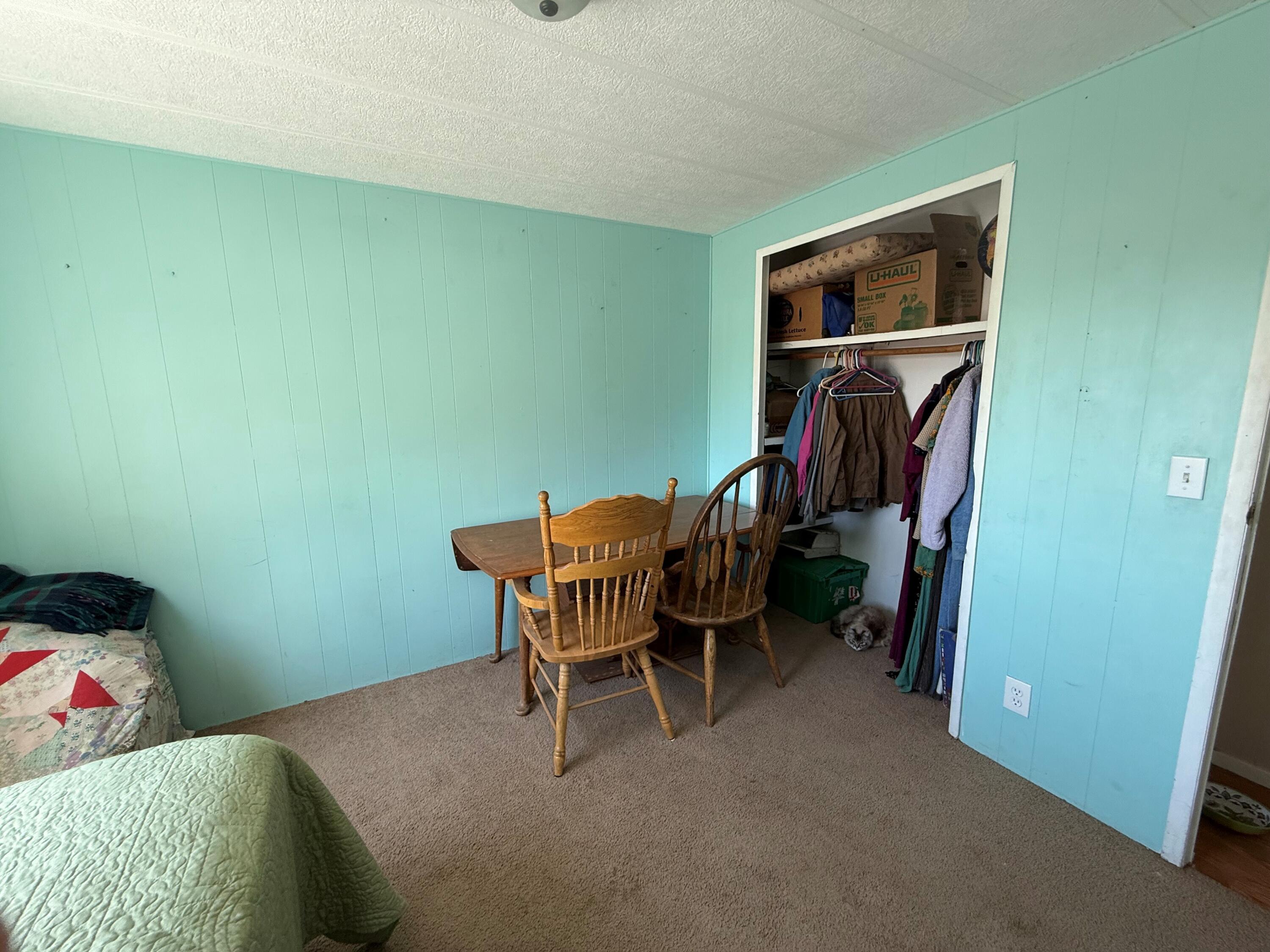 17550 Maupin Road Malin, OR 97632 - Photo 35 of 62 a bedroom with a bed and a chair