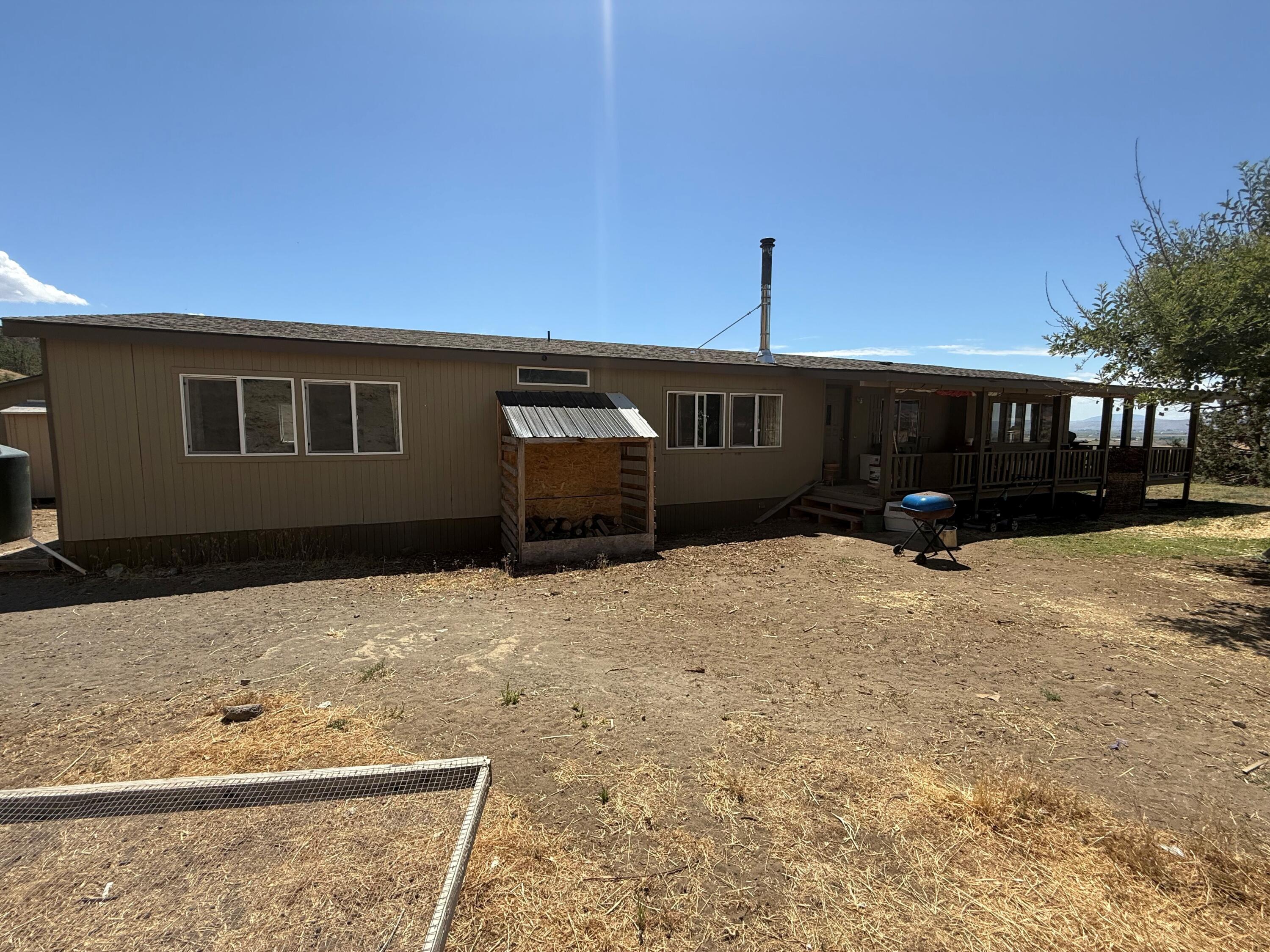 17550 Maupin Road Malin, OR 97632 - Photo 8 of 62 a front view of a house with a yard