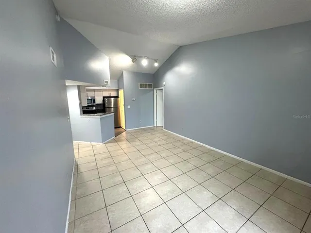a view of a livingroom with furniture