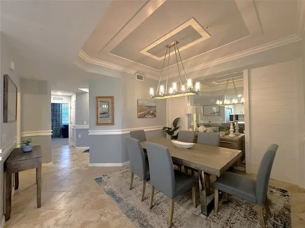 a view of a dining room with furniture