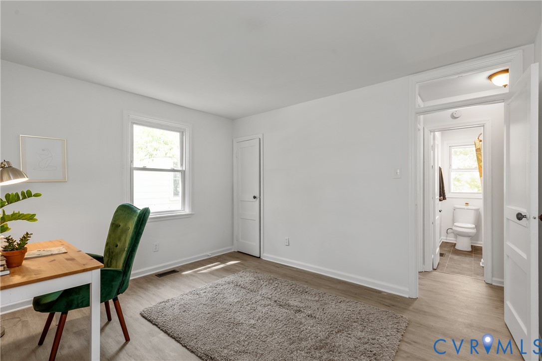3406 Meadowbridge Road Richmond, VA 23222 - Photo 19 of 41 a view of a livingroom with furniture and a window