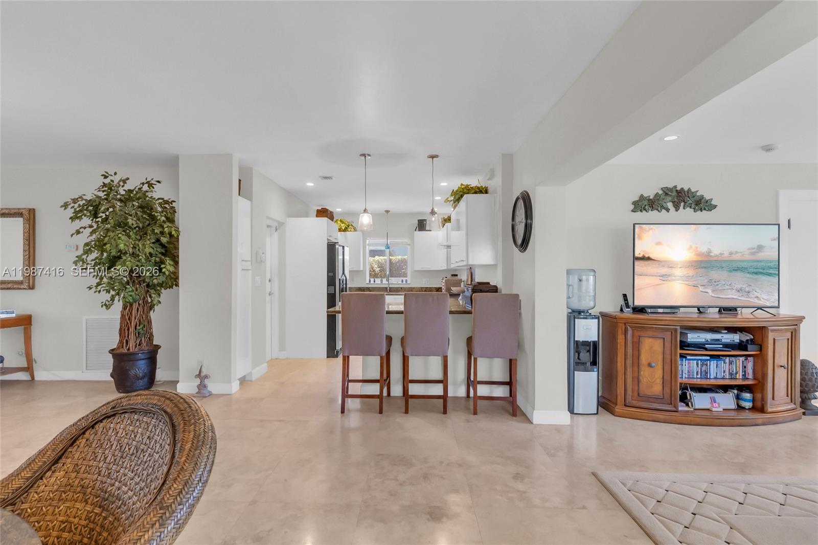 1995 Ixora Road North Miami, FL 33181 - Photo 12 of 30 a living room with furniture and a flat screen tv