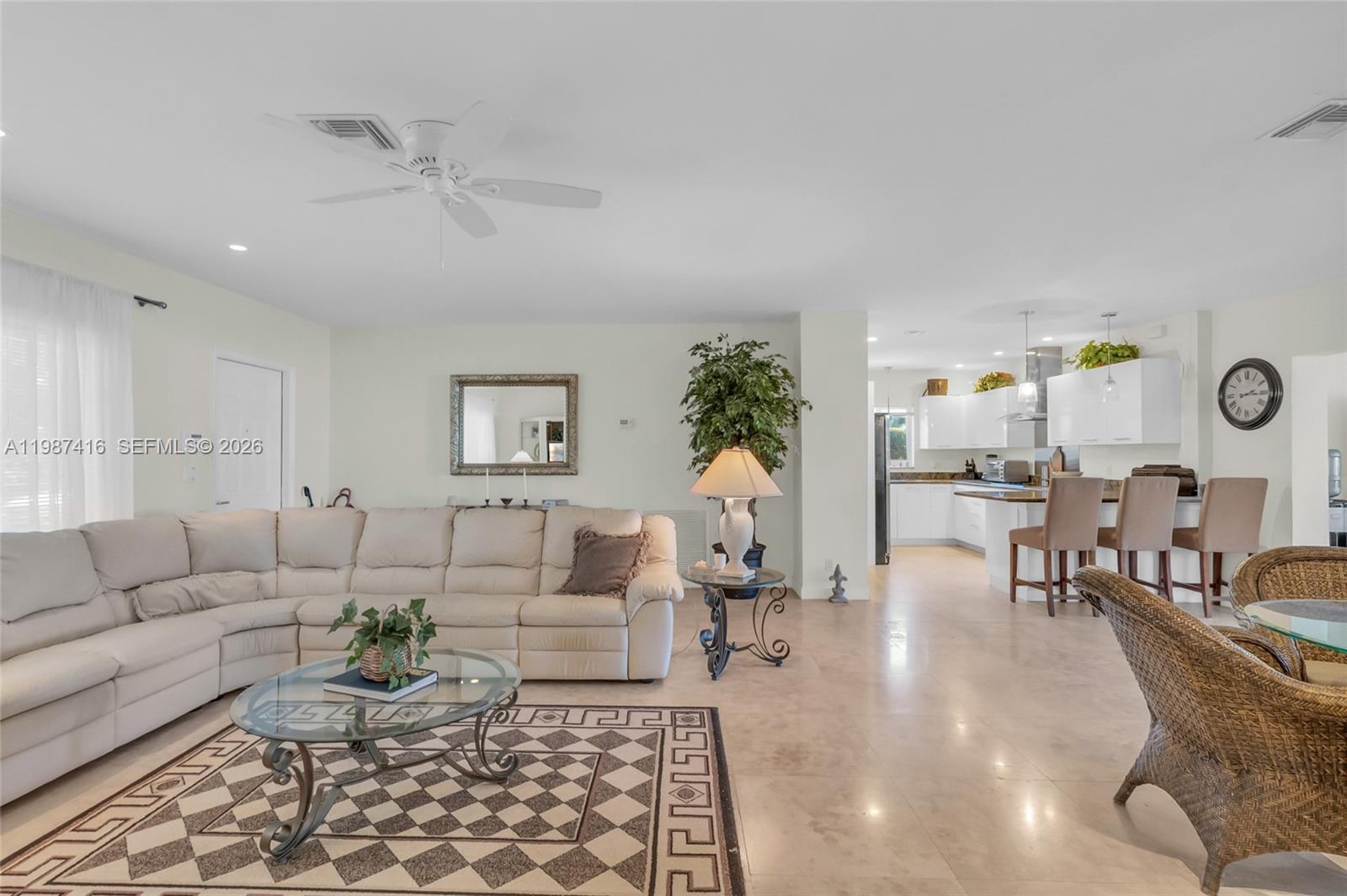 1995 Ixora Road North Miami, FL 33181 - Photo 13 of 30 a living room with furniture and wooden floor