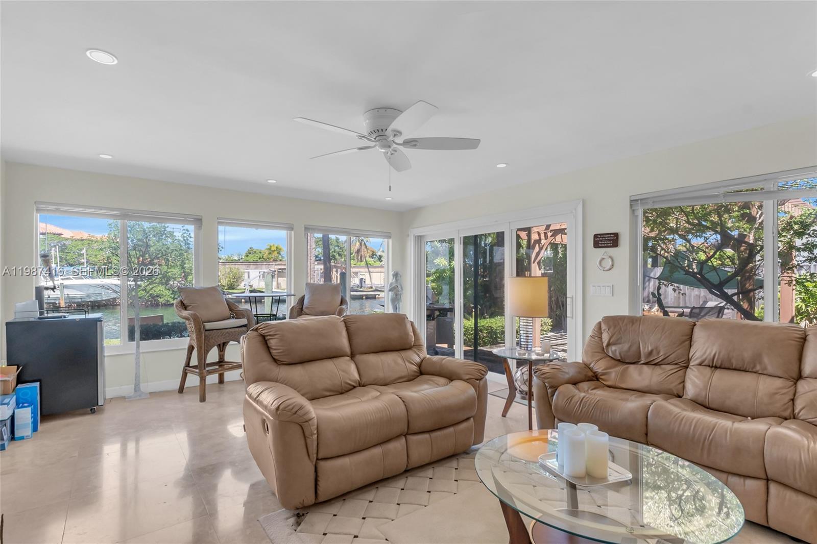 1995 Ixora Road North Miami, FL 33181 - Photo 15 of 30 a living room with furniture and a large window