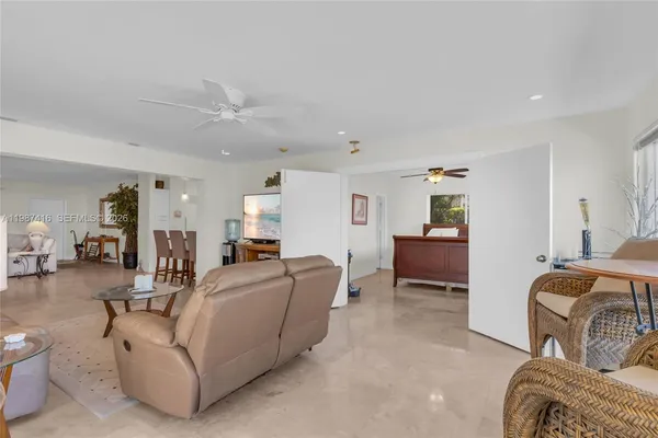a living room with furniture and a couch