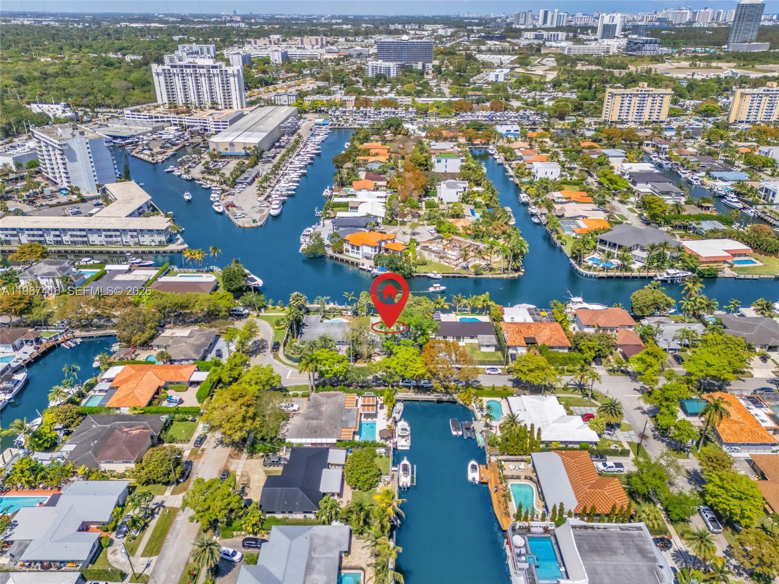 1995 Ixora Road North Miami, FL 33181 - Photo 29 of 30 an aerial view of residential houses with outdoor space
