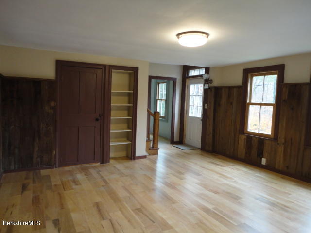 471 River Road Windsor, MA 01270 - Photo 5 of 19 an empty room with closet and windows