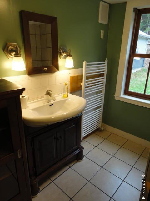 471 River Road Windsor, MA 01270 - Photo 6 of 19 a bathroom with a sink and a mirror