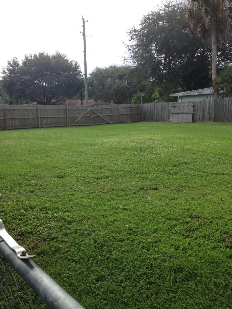 5701 Pennock Point Road Jupiter, FL 33458 - Photo 3 of 22 side yard