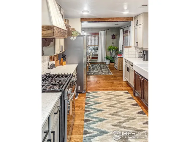 a bathroom with a double vanity sink a mirror and a