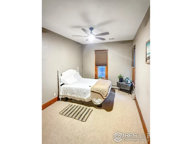 a bathroom with a sink toilet and mirror
