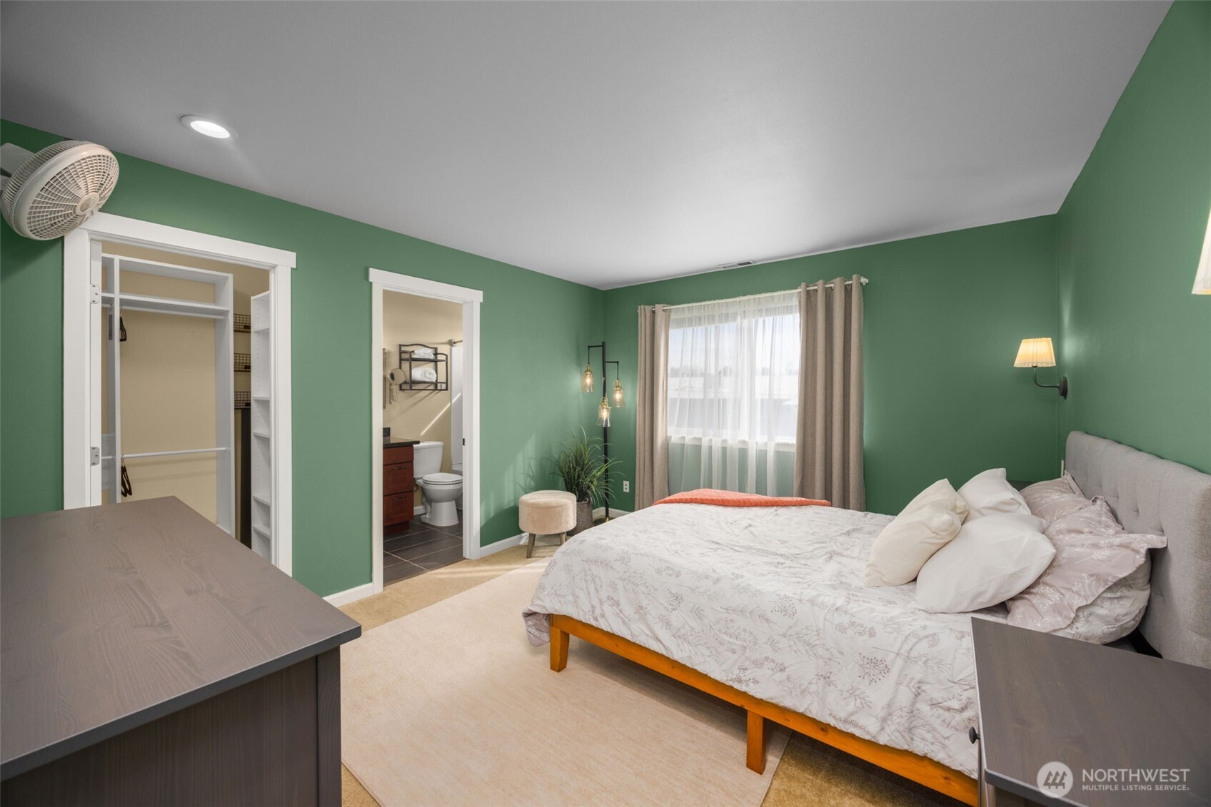 10250 17th Avenue Southwest Seattle, WA 98146 - Photo 11 of 23 a bedroom with a bed and a table