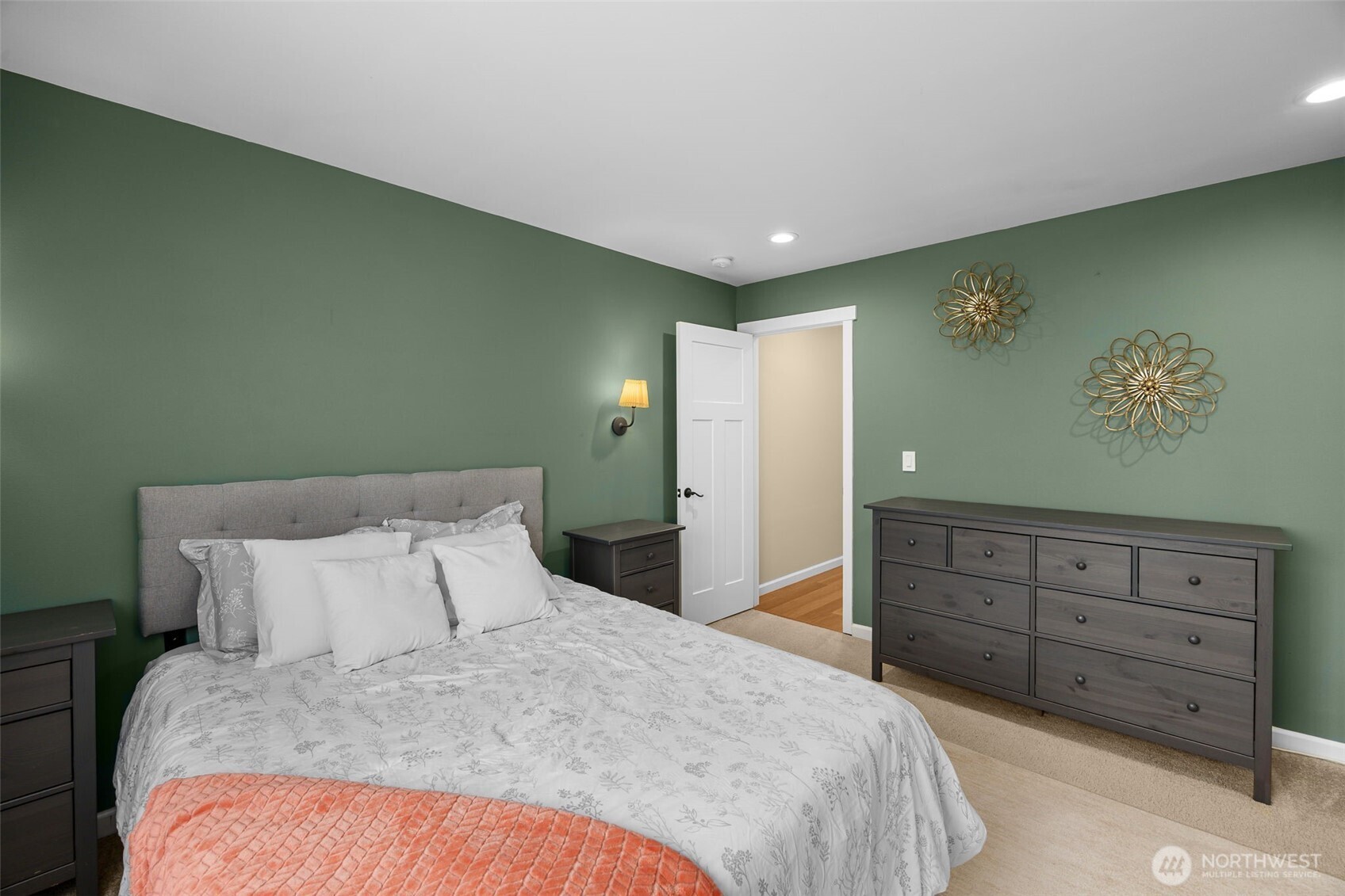 10250 17th Avenue Southwest Seattle, WA 98146 - Photo 12 of 23 a bedroom with a large bed and a dresser